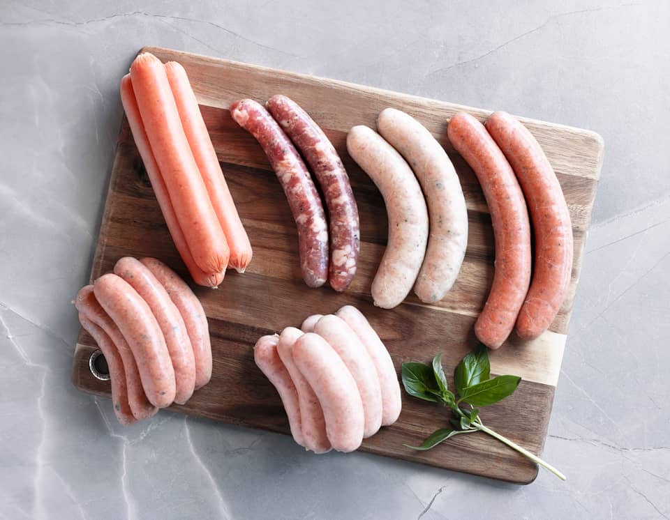 A selection of different sausages on a cutting board